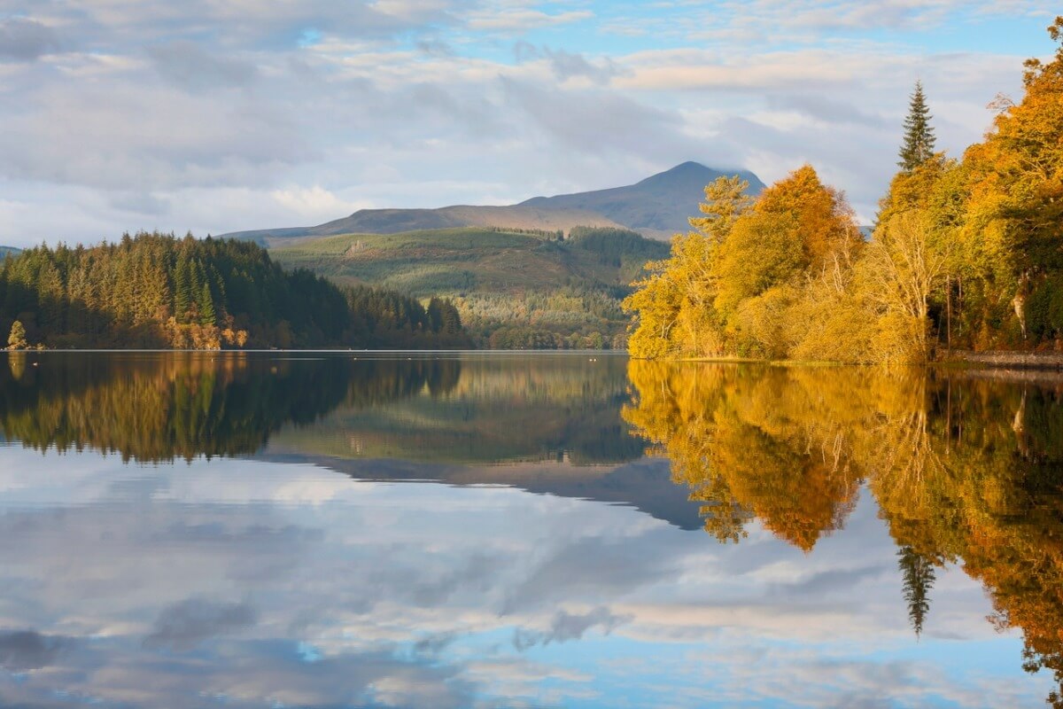Autumn at Loch Ard in the Loch Lomond and Trossachs National Park. Loch Ard is a fresh water loch lying 5km to the west of Aberfoyle and is considered to be the source of the River Forth.