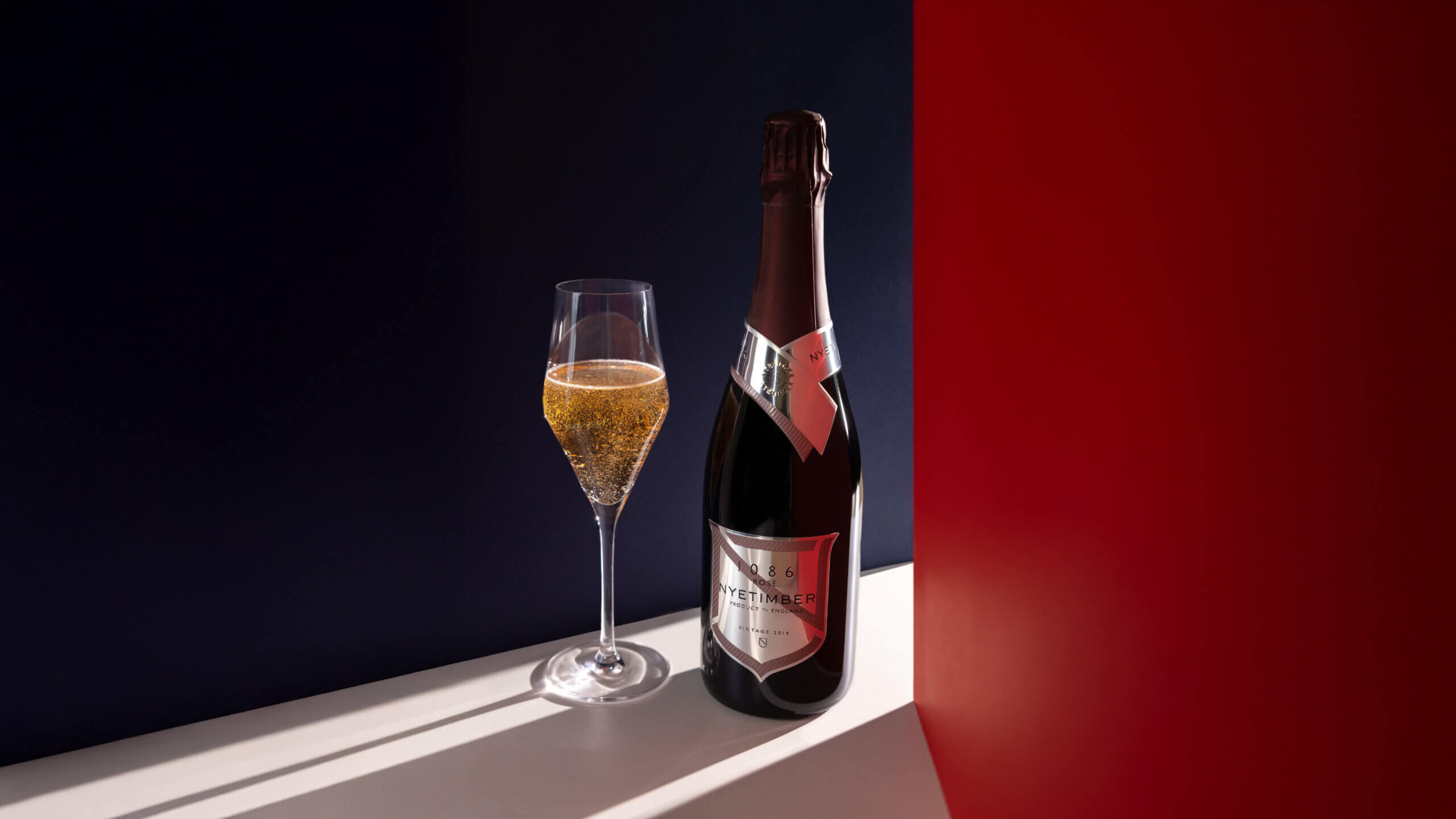 Bottle of British sparkling wine 1086 by Nyetimber Rosé 2014 served in First cabin.