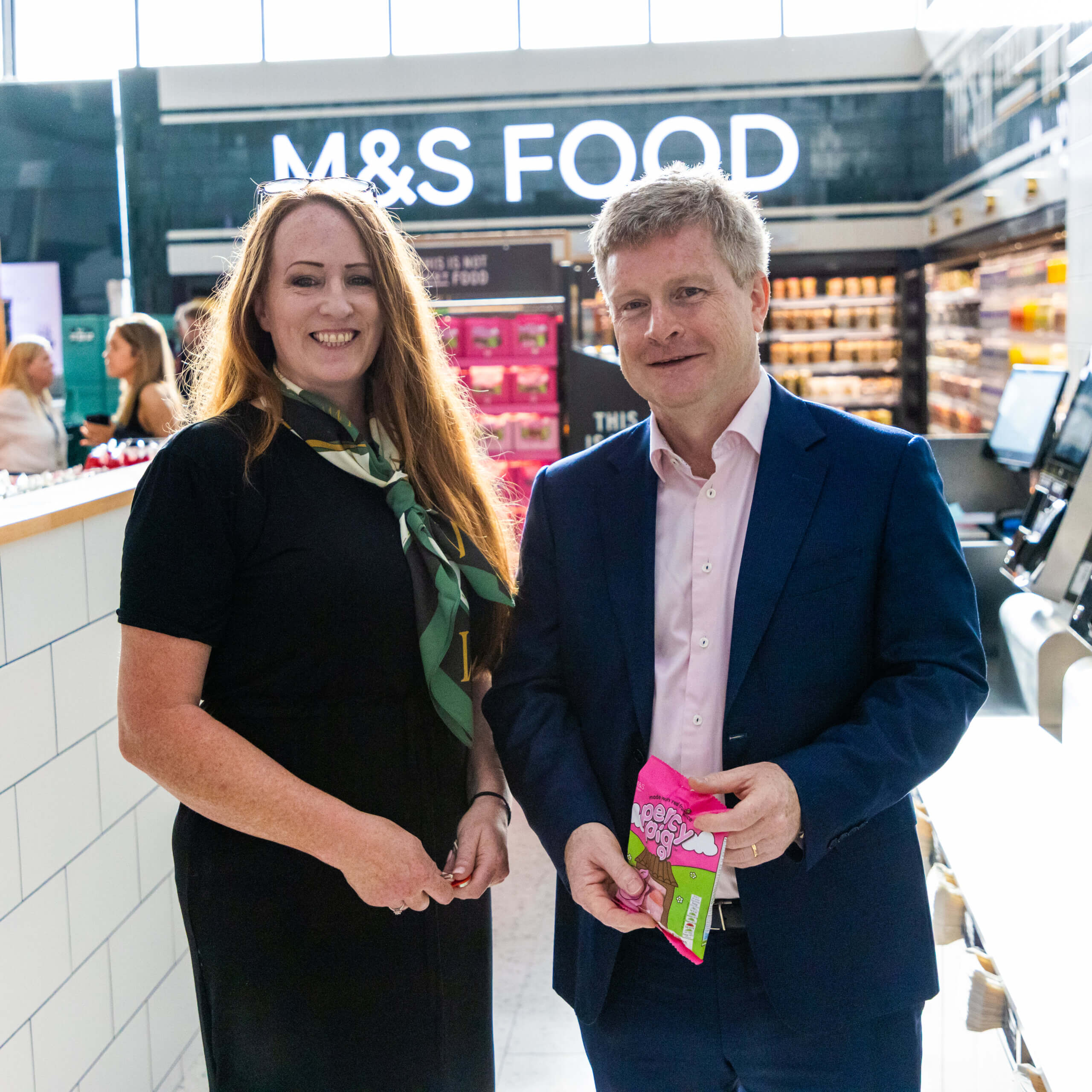 Julie, M&S Customer Assistant (left), Sean Doyle, CEO of British Airways (right)