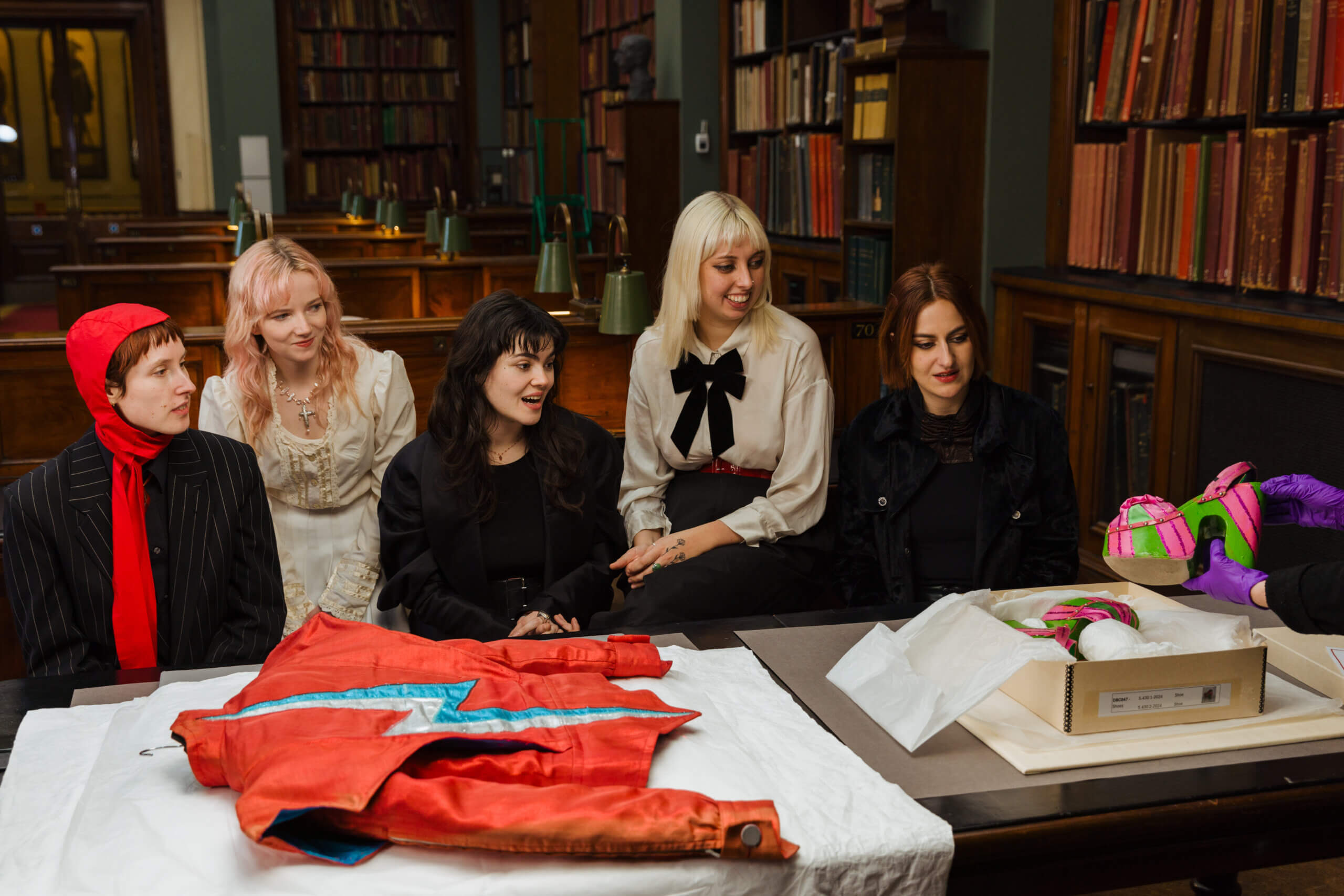 Guest curators, The Last Dinner Party, with items from David Bowie's Archive (2). Photograph by Timothy Eliot Spurr for the Victoria and Albert Museum