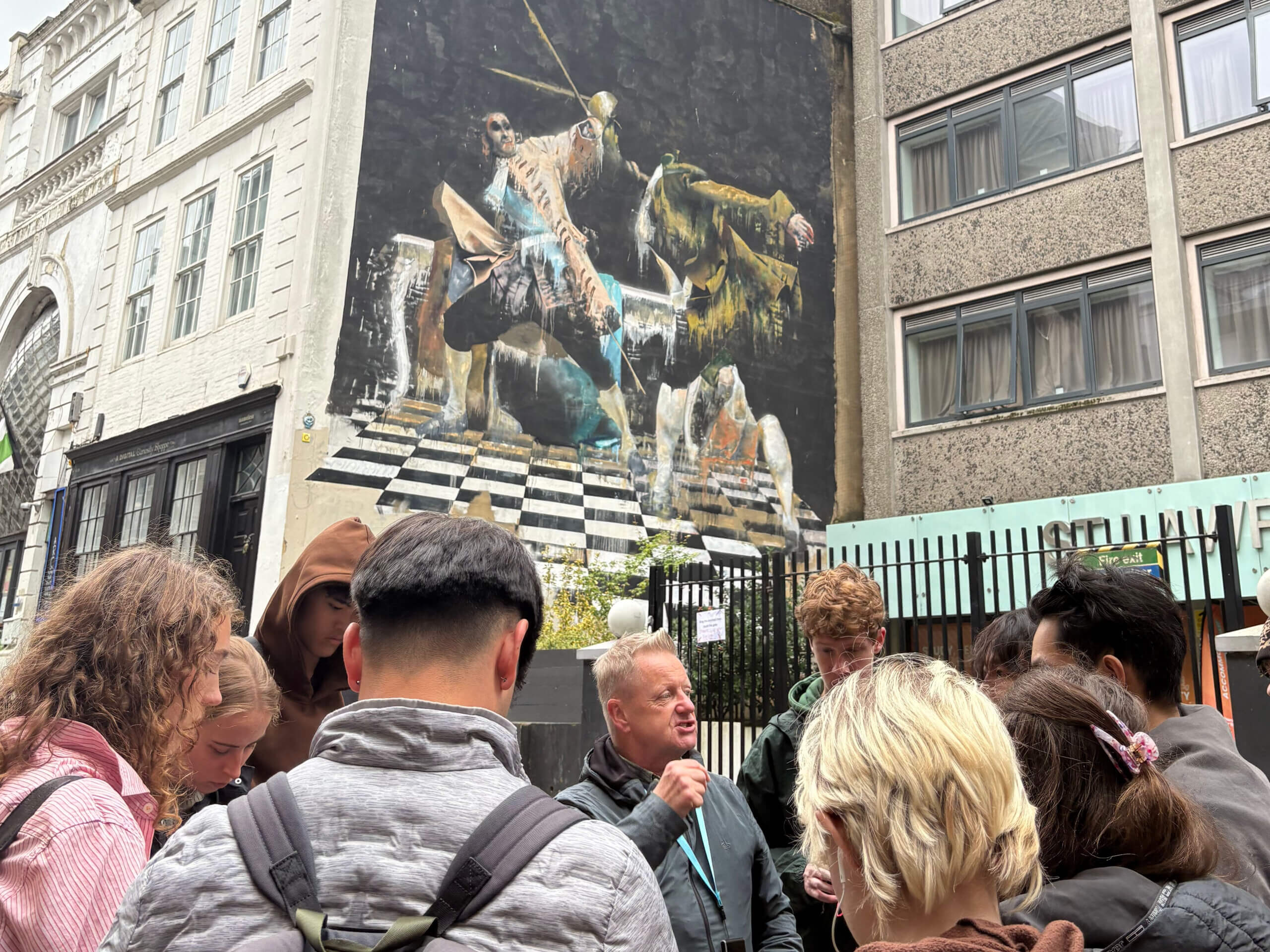 Where The Wall Street Art Tour John Tour - mural The Duel by Conor Harrington
