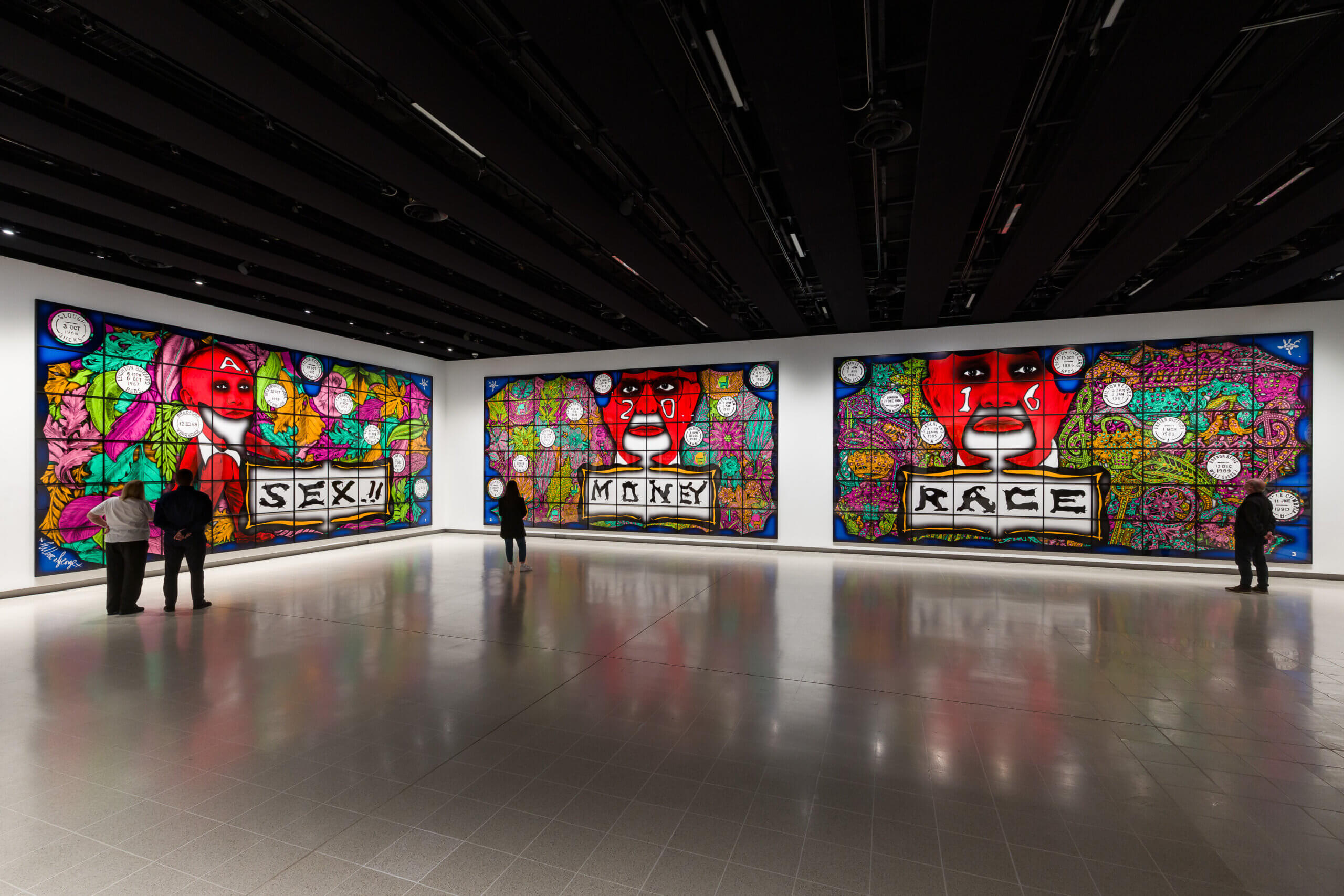 Installation view of Gilbert & George_ 21ST CENTURY PICTURES. SEX MONEY RACE RELIGION [2016]. Photo_ Mark Blower. Courtesy of the Gilbert & George and the Hayward Gallery.