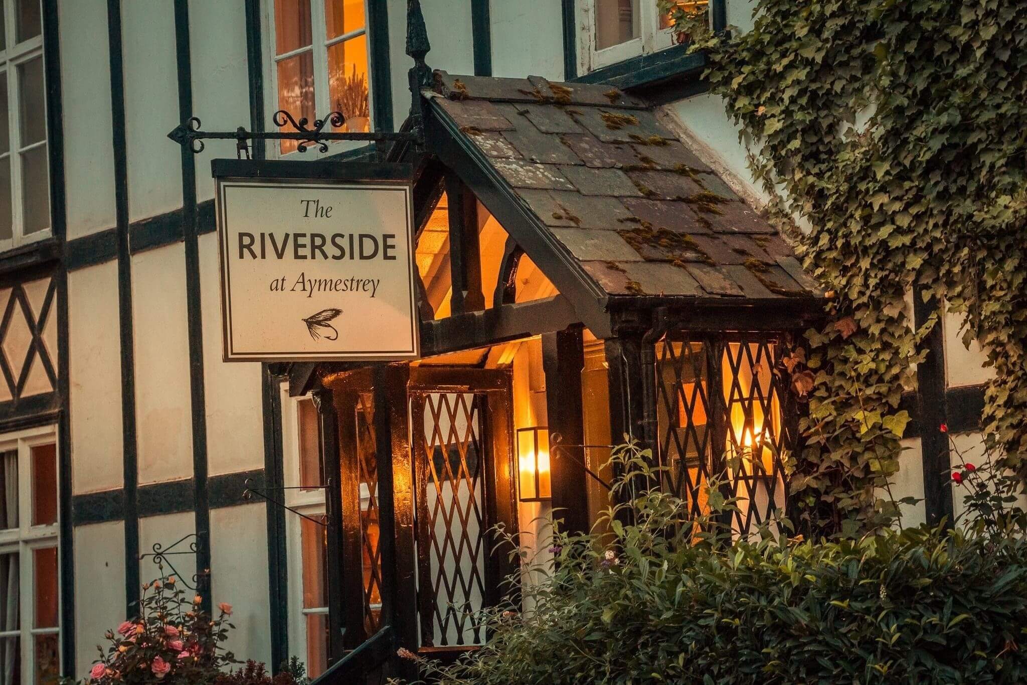 The main entrance to The Riverside Inn Gastropub, in Aymestrey, in Herefordshire.