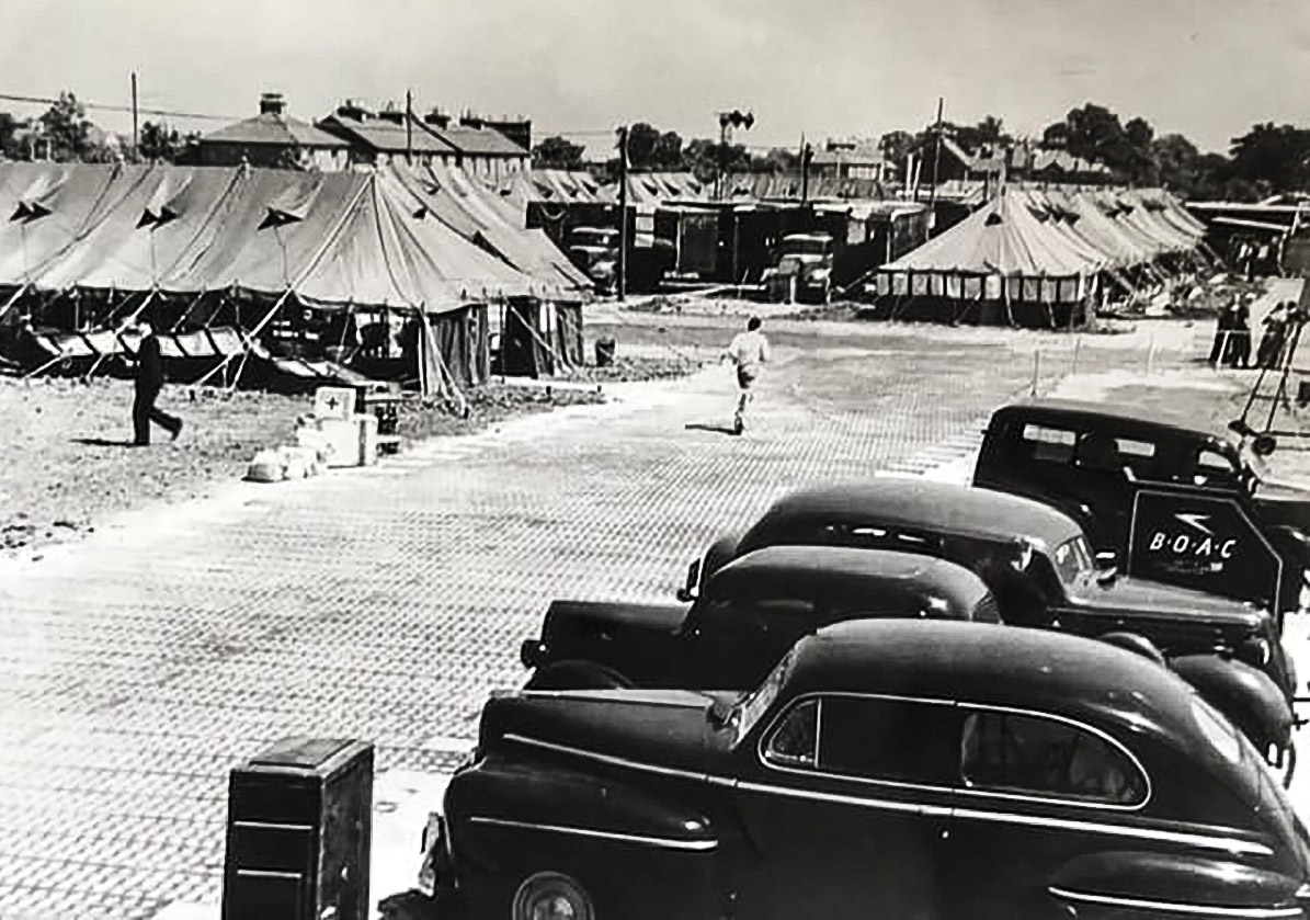 Cars parked and tents used as terminal buildings ikn the early days of Heathrow airtport, 1946. // These 25 pictures showcase some of Heathrow's most iconic moments as it celebrates its 80th birthday. Officially opened as ‘London Airport’ in 1946 following two years of construction, its first flight in the newly post-war era was a converted Lancaster bomber called Starlight that flew to Buenos Aires. In its first year, 63,000 passengers had taken to the skies, compared to the 67 million who now jet off annually. The busiest airport in Europe, renamed Heathrow in September 1966, has seen many iconic moments in its 80 years of operation, from The Beatles’ return home from a US tour to England Rugby bringing home the World Cup.This photo licensed for one time use only in connection with SWNS story on the 80th anniversary of Heathrow Airport, no re-use, no archive.