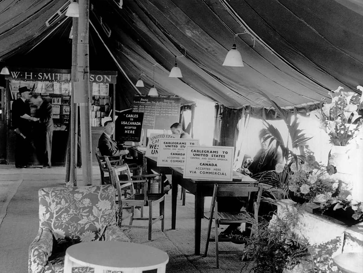 London Airport (later to be re-named Heathrow), interior of one of the ex-military brown marquees serving as arrivals and departures lounges, 1946. // These 25 pictures showcase some of Heathrow's most iconic moments as it celebrates its 80th birthday. Officially opened as London Airport in 1946 following two years of construction, its first flight in the newly post-war era was a converted Lancaster bomber called Starlight that flew to Buenos Aires. In its first year, 63,000 passengers had taken to the skies, compared to the 67 million who now jet off annually. The busiest airport in Europe, renamed Heathrow in September 1966, has seen many iconic moments in its 80 years of operation, from The Beatles return home from a US tour to England Rugby bringing home the World Cup. This photo licensed for one time use only in connection with SWNS story on the 80th anniversary of Heathrow Airport, no re-use, no archive.
