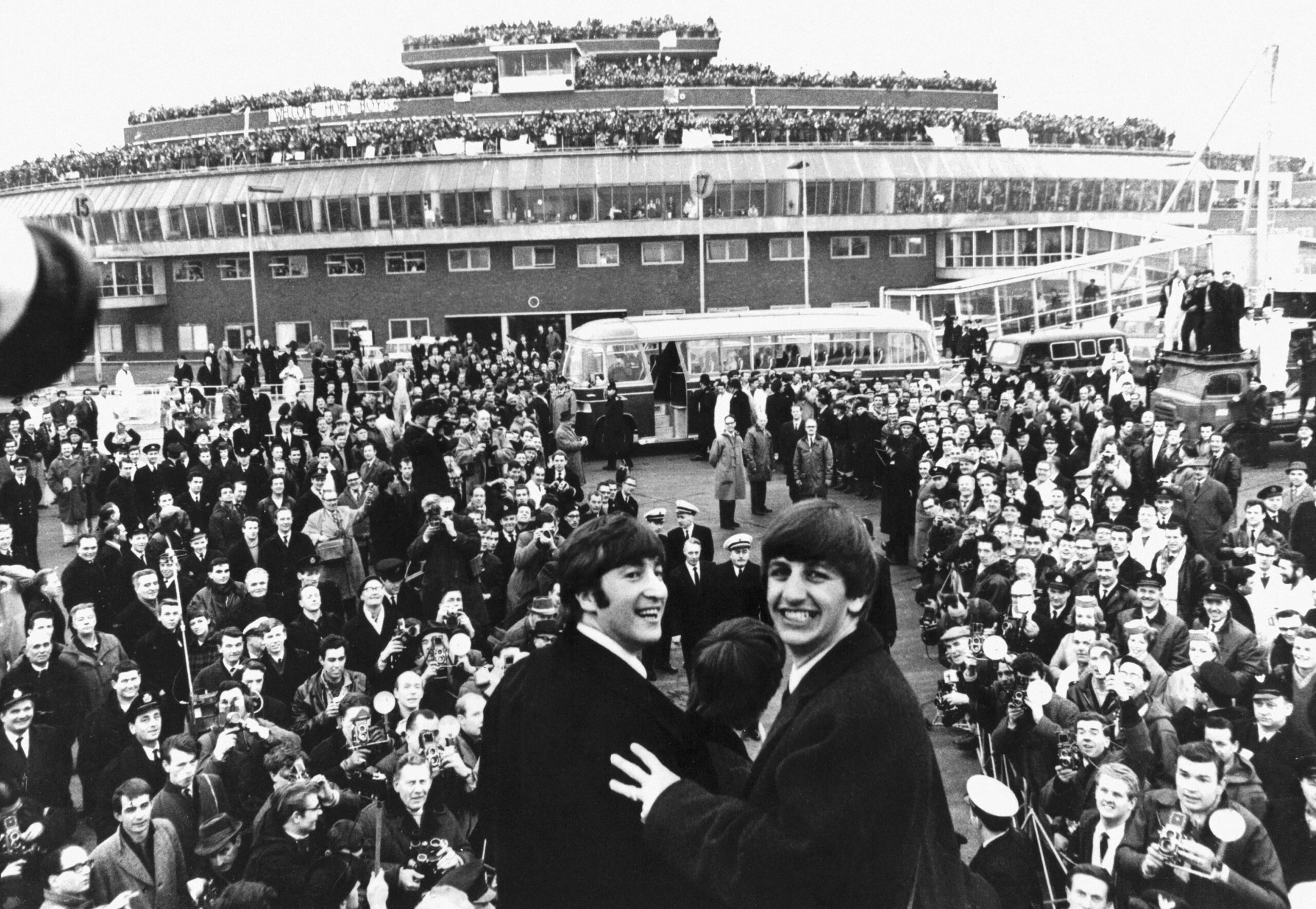 The Beatles arriving at the London Heathrow Airport, after a successful 10 day American Tour. February 22, 1964 England // These 25 pictures showcase some of Heathrow's most iconic moments as it celebrates its 80th birthday. Officially opened as London Airport in 1946 following two years of construction, its first flight in the newly post-war era was a converted Lancaster bomber called Starlight that flew to Buenos Aires. In its first year, 63,000 passengers had taken to the skies, compared to the 67 million who now jet off annually. The busiest airport in Europe, renamed Heathrow in September 1966, has seen many iconic moments in its 80 years of operation, from The Beatles return home from a US tour to England Rugby bringing home the World Cup. This photo licensed for one time use only in connection with SWNS story on the 80th anniversary of Heathrow Airport, no re-use, no archive.