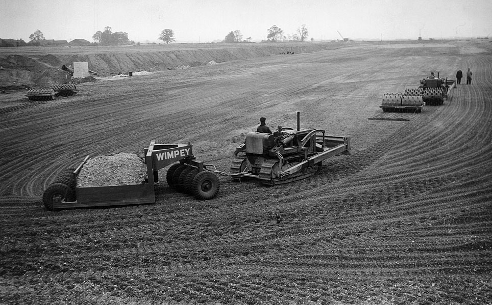 London Airport (later to be re-named Heathrow), seen as workers begin construction of the airport's east-west runway, 1945. // These 25 pictures showcase some of Heathrow's most iconic moments as it celebrates its 80th birthday. Officially opened as London Airport in 1946 following two years of construction, its first flight in the newly post-war era was a converted Lancaster bomber called Starlight that flew to Buenos Aires. In its first year, 63,000 passengers had taken to the skies, compared to the 67 million who now jet off annually. The busiest airport in Europe, renamed Heathrow in September 1966, has seen many iconic moments in its 80 years of operation, from The Beatles return home from a US tour to England Rugby bringing home the World Cup. This photo licensed for one time use only in connection with SWNS story on the 80th anniversary of Heathrow Airport, no re-use, no archive.