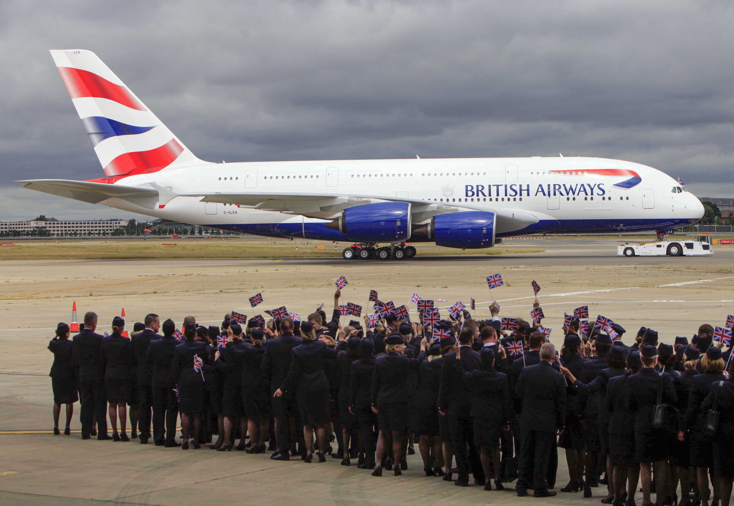 BA staff greet the Airbus A380 at Heathrow Airport as British Airways takes delivery of the new double-decker, the world's largest commercial jet. // These 25 pictures showcase some of Heathrow's most iconic moments as it celebrates its 80th birthday. Officially opened as London Airport in 1946 following two years of construction, its first flight in the newly post-war era was a converted Lancaster bomber called Starlight that flew to Buenos Aires. In its first year, 63,000 passengers had taken to the skies, compared to the 67 million who now jet off annually. The busiest airport in Europe, renamed Heathrow in September 1966, has seen many iconic moments in its 80 years of operation, from The Beatles return home from a US tour to England Rugby bringing home the World Cup.
