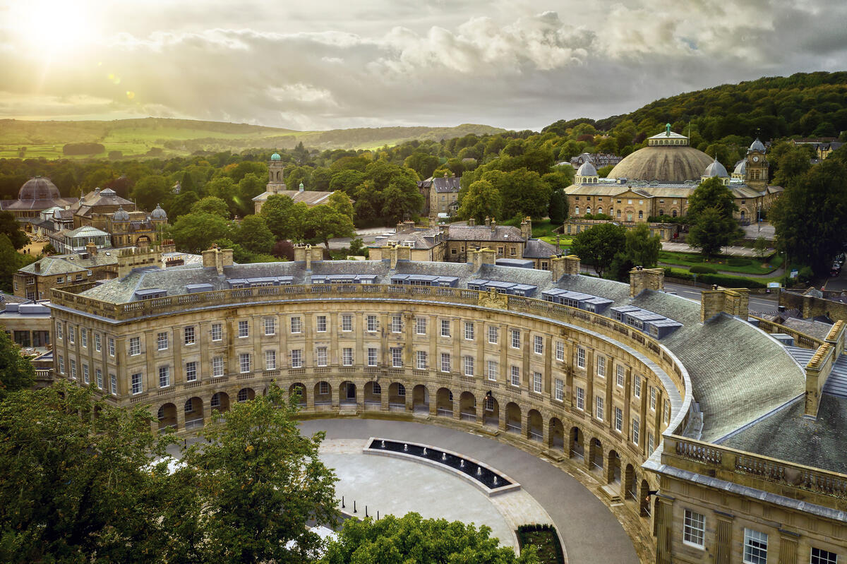 The external arched facade of the Buxton Crescent Hotel and Spa Retreat, in Derbyshire, England.